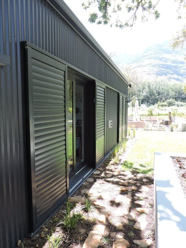 External Sliding Aluminium Shutters — project photo 7